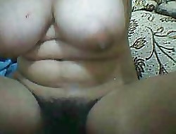 Asian Woman pretence will not hear of flimsy pussy with an increment of chubby boobs in excess of webcam